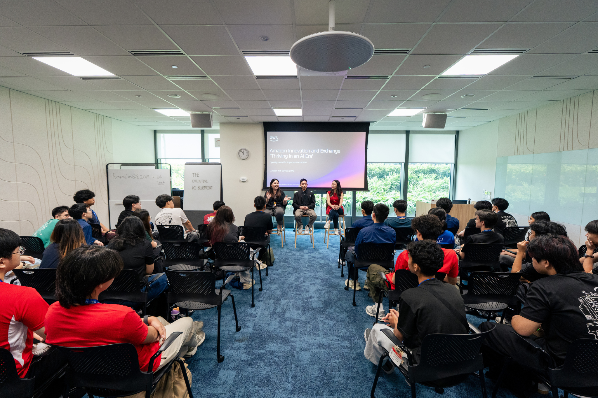 Student delegates attend a Learning Journey at AWS.